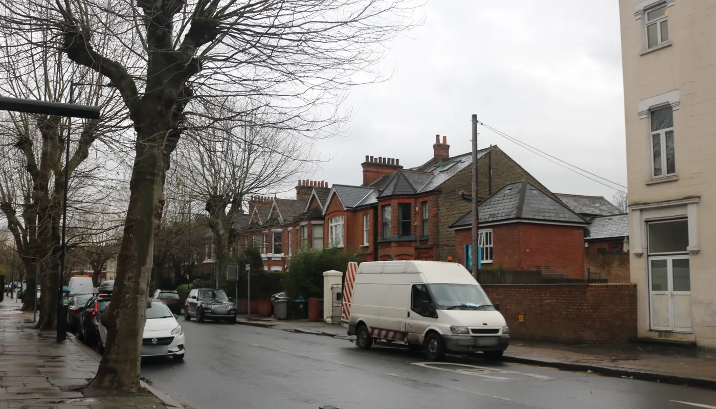 Red brick Edwardian houses on Wrentham Avenue in Kensal Rise, a street of rented family homes inside the Brent selective licensing area